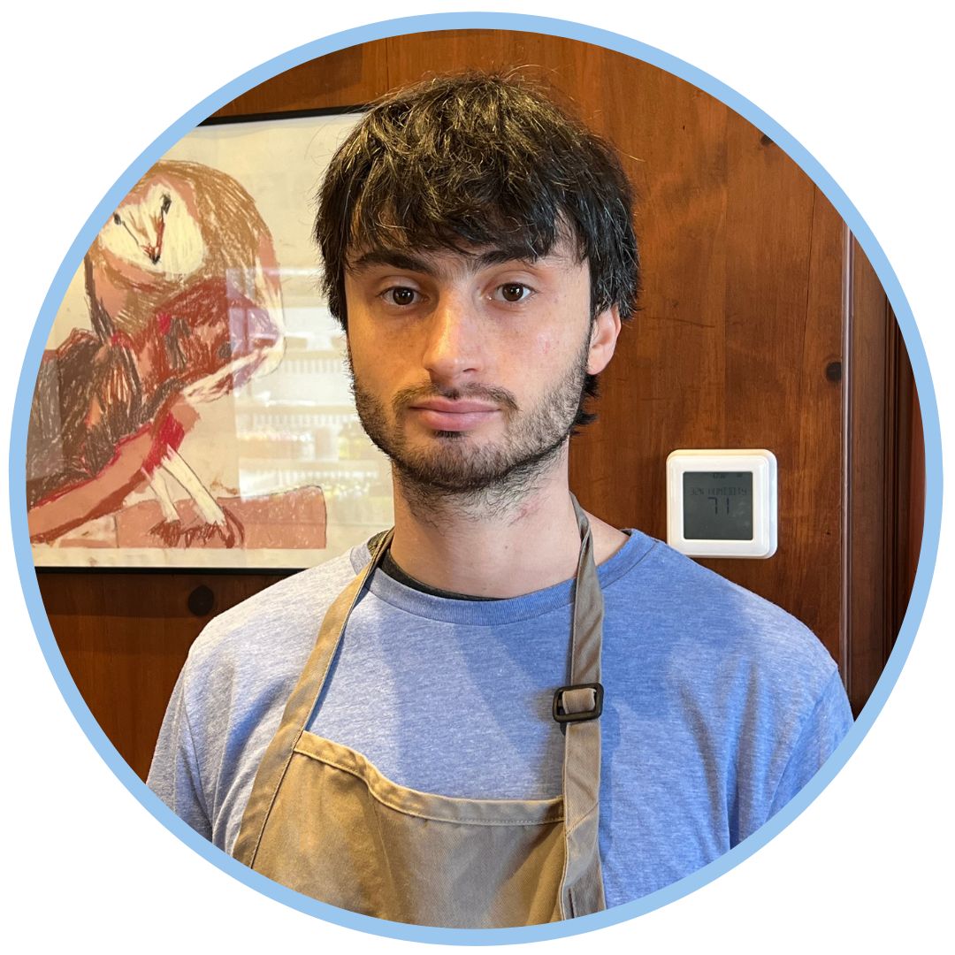 David standing in front of the condiment counter.